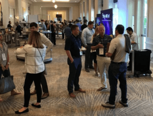 ThinkBIG conference attendees explore partner booths during 2023 event