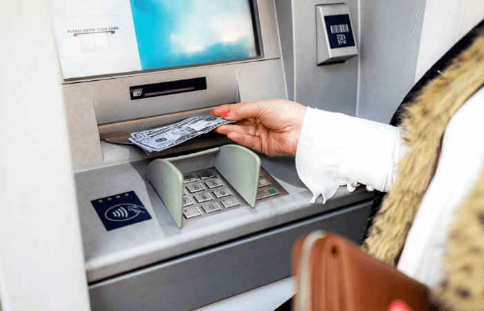 ATM machine dispensing cash