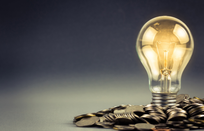 Lightbulb and coins